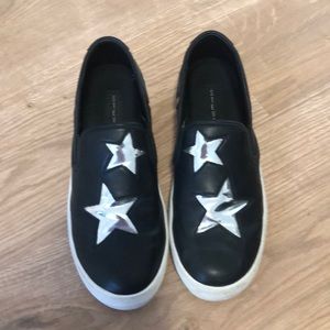Black and silver star slip on sneakers